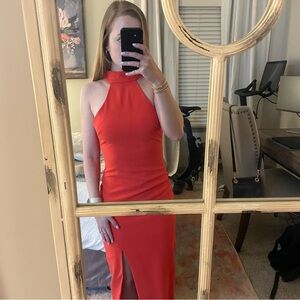 Likely orange/red halter gown